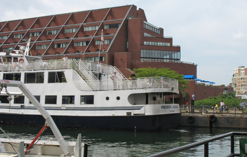 Boston Harbor Cruises passenger boat at Long Wharf next to Marriott Hotel